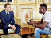  ??  ?? A Palazzo Il presidente Macron con Gassama (Afp)