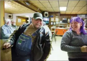  ?? DAVID GOLDMAN — ASSOCIATED PRESS ?? Terry Stinson, left, talks with Deborah Harmon at the Frosty Freeze restaurant in Sandy Hook, Ky., earlier this month.