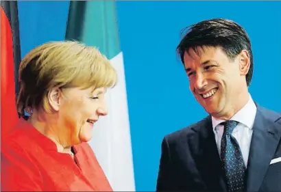  ?? HANNIBAL HANSCHKE / REUTERS ?? La canciller alemana, Angela Merkel, y el primer ministro italiano, Giuseppe Conte, ayer en Berlín