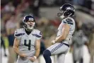  ??  ?? Seahawks kicker Jason Myers (right) celebrates with Michael Dickson after kicking the game-winning field goal on Monday night. Photograph: Tony Avelar/AP