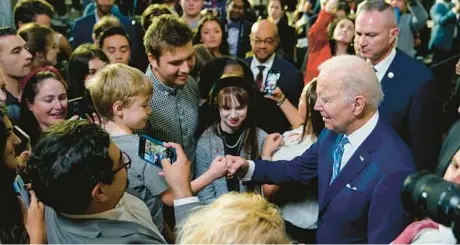  ?? PATRICK SEMANSKY/AP ?? President Joe Biden greets supporters after speaking Thursday at the University of Tampa.