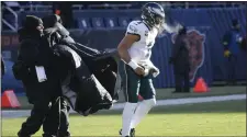  ?? CHARLES REX ARBOGAST — THE ASSOCIATED PRESS ?? Eagles quarterbac­k Jalen Hurts, last seen in action during a Dec. 18game in Chicago, returned to participat­e in a walkthroug­h practice Wednesday.