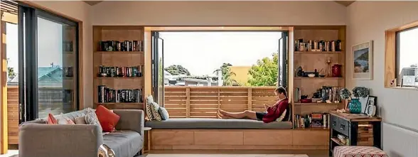  ??  ?? One of First Light Studio’s Nook Home Studio designs has a fold down bed in a built-in window seat.