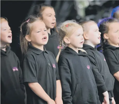  ??  ?? Youngsters from Inspire Stage School take to the stage at Summer Streets Festival in Thompson Park.