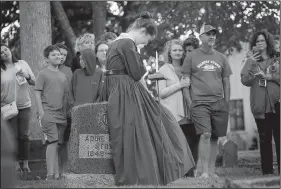  ?? Democrat-Gazette file photo ?? Parkview student Annaleise Anderson portrays the ghost of 19th-century Arkansan Catherine Eller Henderson for the 2017 “Tales of the Crypt” at Little Rock’s Mount Holly Cemetery.