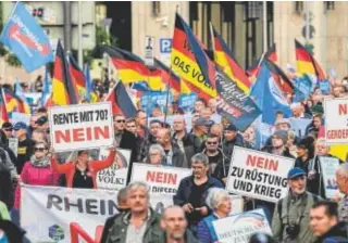  ?? // AFP ?? Participan­tes en la marcha convocada ayer en Berlín por AfD