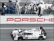  ?? PICTURE: REUTERS ?? The Porsche 919 Hybrid number 19 of drivers Nick Tandy of Britain, Earl Bamber of New Zealand, and Nico Hulkenberg of Germany were the winners of the Le Mans 24-Hour sportscar race in Le Mans.