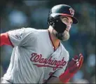  ?? Dustin Bradford Getty Images ?? BRYCE HARPER, the prize of this year’s free agent class, could be a target.