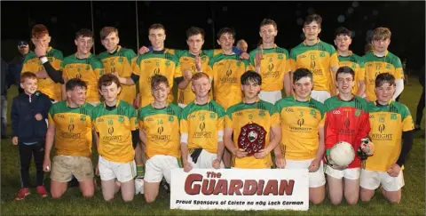  ??  ?? The triumphant Our Lady’s Island/St. Fintan’s squad with the spoils of success.