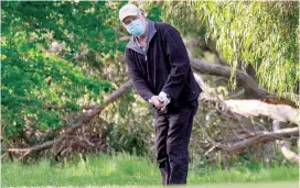  ??  ?? Left - Rob Fredericks­on punches the ball out of some light rough on the second hole. Rob has been a member at Drouin for seven years now.