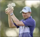  ?? ?? Matt Fitzpatric­k shows off the trophy after his Valderrama win