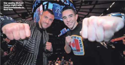  ??  ?? Star quality: Michael Conlan (right) with Vasyl Lomachenko in New York