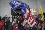  ?? JOHN MINCHILLO — THE ASSOCIATED PRESS FILE ?? On Jan. 6, Trump supporters gather outside the Capitol in Washington.