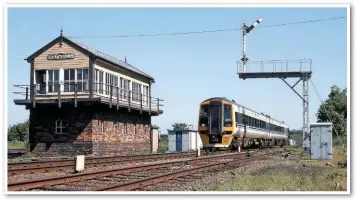  ??  ?? Forming the 1517 Manchester Piccadilly to Llandudno, 158756 passes Holywell Junction SB on May 29 1997. The LNWR SB dates from when the route was quadrupled and stands between the Up and Down lines. It was granted Grade 2-listed status in 1991 and...