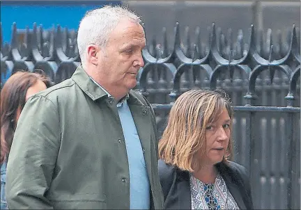  ??  ?? FAMILIES: Matthew and Jacqueline McQuade arrive to hear legal arguments at the Court of Session in Edinburgh. Picture: Gordon Terris