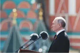  ?? GAVRIIL GRIGOROV, SPUTNIK, KREMLIN POOL PHOTO VIA AP ?? Russian President Vladimir Putin speaks Monday during the Victory Day military parade, marking the 78th anniversar­y of the end of World War II, in Red Square in Moscow.