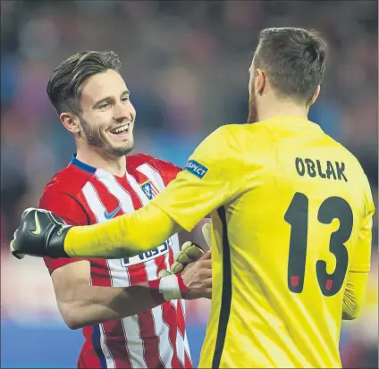  ?? FOTO: SIRVENT ?? Saúl Ñíguez con Jan Oblak tras una victoria El canterano quiere que siga el esloveno