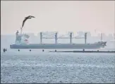  ?? ?? The ship Navi-Star carrying a load of corn starts its way from the port in Odesa, Ukraine, on Aug 5, 2022. Ukraine is a major global grain supplier but the war had blocked most exports, so the July 22 deal aimed to ease food security around the globe. World food prices have been soaring in a crisis blamed on the war, supply chain problems and COVID-19. (AP)
Inflation, war implicatio­ns blamed