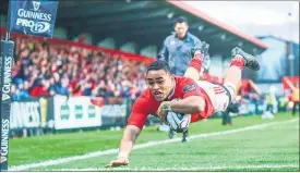  ??  ?? FLYING LOW: Francis Saili helps Munster on its way to a win over Ospreys. PHOTO / PHOTOSPORT