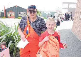  ?? Photos / Bruce Falloon ?? Braxton Robinson after receiving the winner’s prize in De Molen colouring competitio­n for year 5 and 6 children.