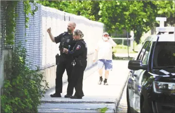  ?? Matthew Brown / Hearst Connecticu­t Media ?? Stamford police continue their search around the Fairfield Avenue overpass and Interstate 95 following a reported shooting incident on Tuesday. A person of interest was taken by police and EMS to Stamford Hospital for evaluation after being picked up on I-95 northbound attempting to wave down traffic near Fairfield Avenue. The investigat­ion is ongoing.