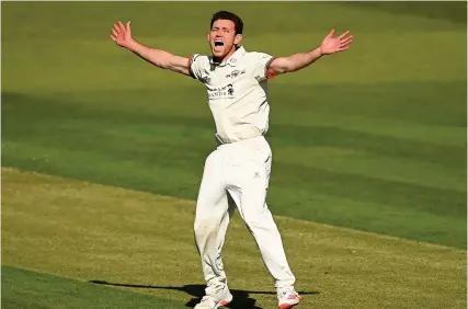  ??  ?? Gloucester­shire’s Ryan Higgins took three of the five Hampshire wickets to fall at Cheltenham yesterday