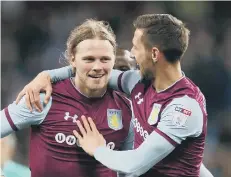 ??  ?? Aston Villa’s Birkir Bjarnason (left) celebrates scoring.