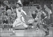  ?? NWA Democrat-Gazette/J.T. WAMPLER ?? Arkansas’ Isaiah Joe comes away with the ball against Texas Southern’s Eden Ewing on Tuesday at Bud Walton Arena in Fayettevil­le. Arkansas won 82-51.