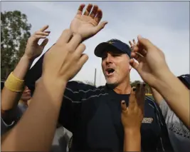  ?? FILE PHOTO BY WILLIAM WILSON LEWIS III — THE PRESS-ENTERPRISE ?? Cal Baptist softball coach Mike Smith recently picked up the 1,000th win of his career.