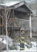  ?? ANDREA PEACOCK/The Daily Courier ?? Kelowna fire crews investigat­e a fire at a townhouse complex in the 1200 block of Cameron Avenue last Wednesday.