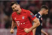  ?? — AP ?? Bayern Munich’s Robert Lewandowsk­i celebrates a goal against R.S. Belgrade in the Champions League.