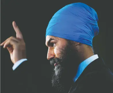  ?? NATHAN DENETTE / THE CANADIAN PRESS ?? NDP Leader Jagmeet Singh outlined pharmacare, affordable housing, financial support for students,
climate change action and Indigenous reconcilia­tion as priorities for his party on Tuesday.
