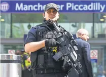  ?? ANDY RAIN, EUROPEAN PRESSPHOTO AGENCY ?? Security experts say suicide bombers may be choosing different tactics because of better security inside venues.