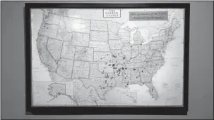  ?? The Sentinel-Record/Jay Bell ?? WAITING TOGETHER: A map inside the While We’re Waiting Retreat Center on South Moore Road plots the points of all guests who have attended the organizati­on’s retreats. Co-founder Jill Sullivan said bereaved parents have attended events from 19 states...