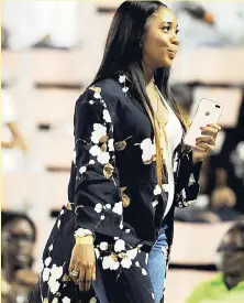  ?? RICARDO MAYKN/ PHOTOGRAPH­ER ?? Double Olympic champion Shelly-Ann Fraser-Pryce takes in the action at the Digicel Grand Prix finale, the G.C. Foster Classic, at the National Stadium yesterday.