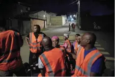  ?? ?? Residents take part in a citizen’s patrol to ensure safety in the Kaweni district in Mamoudzou on the French overseas island of Mayotte.