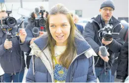  ?? AP ?? Former WTA number-one tennis player Simona Halep of Romania arrives surrounded by the media for a hearing in the arbitratio­n procedures against Internatio­nal Tennis Integrity Agency (ITIA) at the internatio­nal Court of Arbitratio­n for Sport (CAS), in Lausanne, Switzerlan­d on Wednesday.