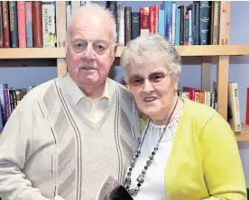  ??  ?? Reading up Myra and Bob Goodwin in the library within the church