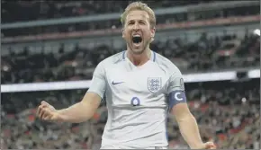  ??  ?? 2 Harry Kane celebrates after his lastgasp winner secured England’s place at the World Cup finals.