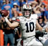  ?? AP/JOHN RAOUX ?? Auburn freshman quarterbac­k Bo Nix has passed for 1,125 yards and 8 touchdowns, while also rushing for 191 yards and 2 scores, entering Saturday’s game at Arkansas.