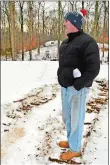  ?? SEAN D. ELLIOT/THE DAY ?? Rob Renehan stands in the snow in what will be Kathryn Court Estates.