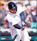  ?? ?? Detroit Tigers designated hitter Miguel Cabrera connects for a single during the sixth inning of the first baseball game of a doublehead­er against the Colorado Rockies, on April 23, in Detroit. (AP)