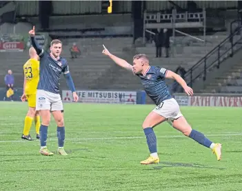  ?? ?? Lewis Vaughan wheels away in celebratio­n after scoring for Raith Rovers