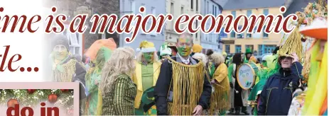  ??  ?? Members of the Green and Gold wren from Dingle get set for the Wren day march in the town which takes place in Dingle each year.