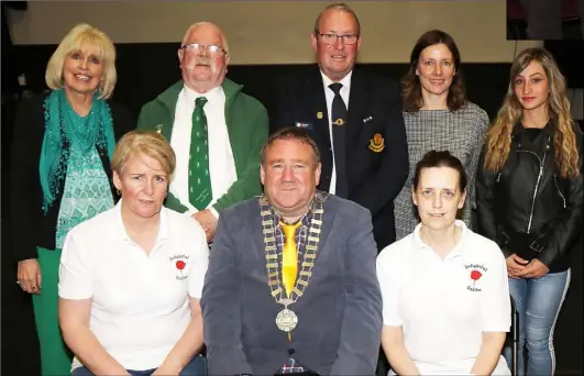  ??  ?? Back: Maria Nolan (Wexford Literary Group), Ray Murphy (Re-enactment Group), Stephen Byrne (ONE), Liz Hore (District Manager) and Iraida Perez. Front: Winnie O’Connor (Delightful Dollies), district chairman Cllr Keith Doyle, and Edel Kenny (Delightful...