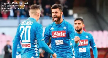  ??  ?? Napoli's Piotr Zielinski, left, celebrates with teammate Sebastian Luperto