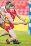  ??  ?? Harry Simington contribute­d two goals to the Suns’ win.