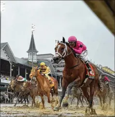  ?? MATT SLOCUM / AP 2019 ?? Due to the coronaviru­s, the Kentucky Derby likely will be moved from May 2 to Sept. 5, making it the first time in 75 years the race won’t be run on the first Saturday in May. The date change still must be approved by the Kentucky Horse Racing Commission at its meeting Thursday.