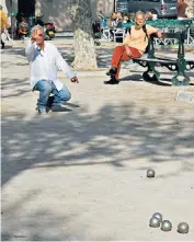  ??  ?? Spherical boules would roll away in hilly Cagnes-surMer, where they are cuboid in shape