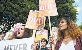  ?? ANDY RAIN/EPA ?? Protesters outside No. 10 Downing St. demonstrat­e against Prime Minister Theresa May.